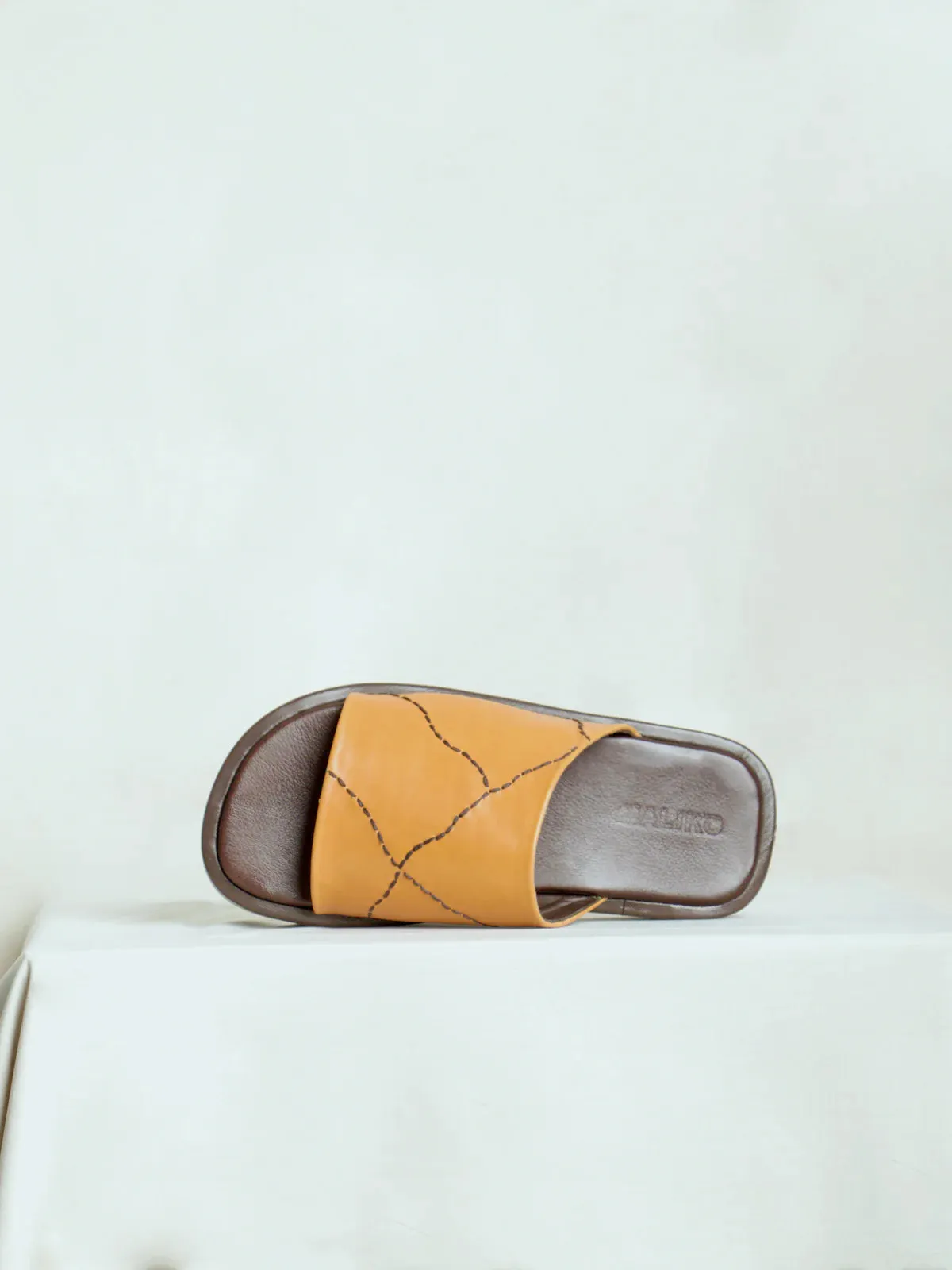 Maliko Agbisi shoes with Leather upper, leather insole, and lining Moab Slide